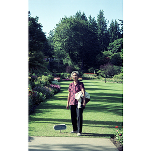 Chinese Progressive Association member visiting a botanical garden on a trip to Vancouver