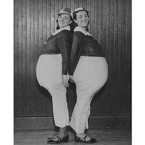 Twins from the Boston-Bouvé College dress as Tweedle-dee and Tweedle-dum