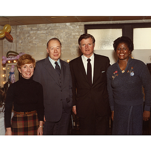 Kenneth Ryder, Mrs. Ryder, Senator Edward Kennedy, and Ellen Jackson pose together at Senator Kennedy's visit
