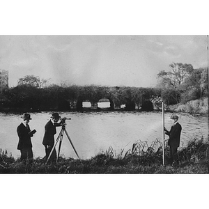 Students conducting a Stadia Survey for class in surveying fieldwork