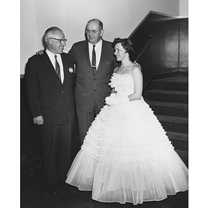 Professor Charles Baird poses with former students Charles Anderson and his daughter, Homecoming Queen Elizabeth Anderson