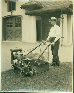 Up to date lawn mower, location unknown, ca. 1920