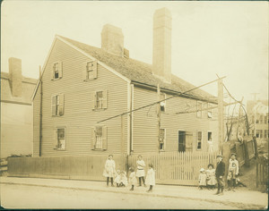 Exterior view of Gedney House with children standing on street, Salem, Mass.