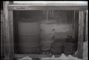 Millers Falls: oil drum in a lean-to shed