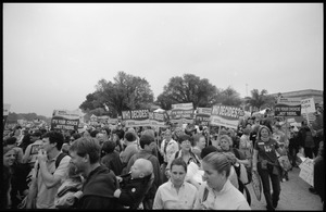 Throng of marchers on the National Mall for the 2004 March for Women's Lives carrying signs