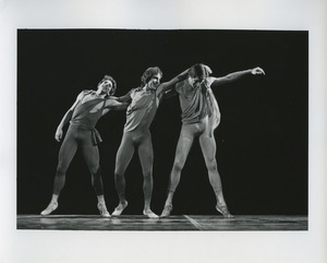 Three male dancers performing