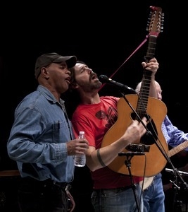 Guy Davis performing on stage with Tao Rodriquez-Seeger at the tribute concert to George Wein held at Studio Space, New York City