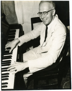 W. L. Holland at the piano