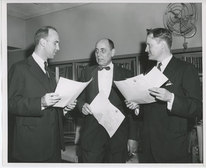 Dr. Robert Darling with two unidentified men at Institute Day