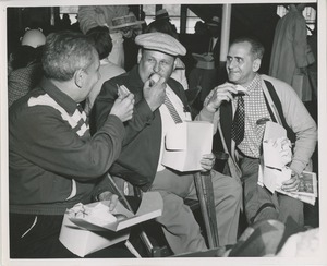 Men eating on boat ride