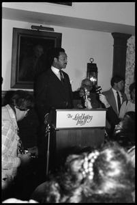 Jesse Jackson at the podium, addressing supporters