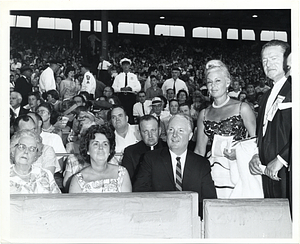 Mary Collins and Mayor John F. Collins sit before a crowd at Fenway Park