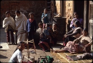 Mothers and daughters in Bhaktapur courtyard