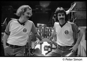 Bill Kreutzman (left) and Mickey Hart, drummers for the Grateful Dead, standing in front of their kit