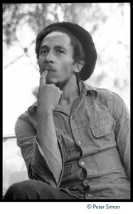 Bob Marley: half-length portrait at his house in Kingston in contemplative pose