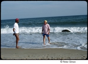 Ram Dass (right) and Tom Lesser walking on the water's edge