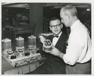 Man assembling vacuum motors