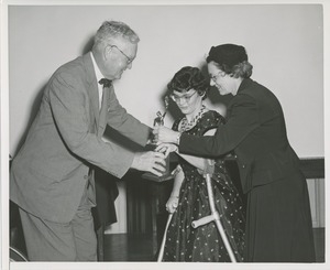 Bruce Barton gives Dorothy Donnelly her 'Handicapped Oscar' at the Three to Make Ready premier