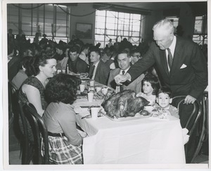 Clients enjoying dinner at Thanksgiving celebration