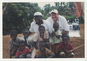 Norman Joyner with a group of children