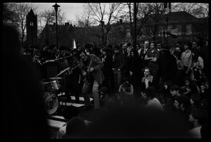Crowd on Cambridge Common: J. Geils Band performing (J. Geils, guitar)