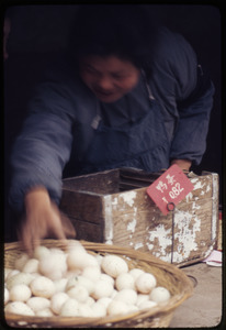 Woman reaching for eggs