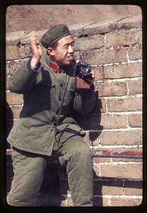 People's Liberation Army soldier smiling, thanks for picture