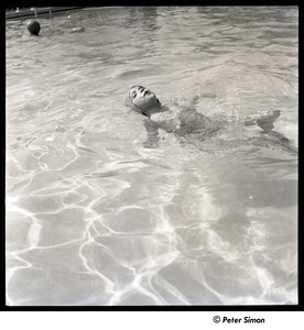 Carly Simon with swim cap in pool - Digital Commonwealth