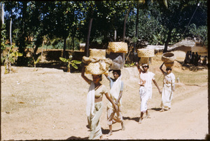 Women carrying baskets