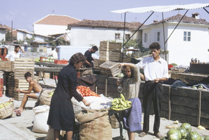 Selling vegetables at market