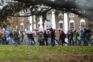 UMass student strike: strikers marching past Goodell Hall