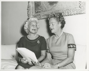 Margaret Milbank Bogert and an unidentified woman discussing paperwork