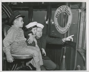 Man and children on annual boat ride