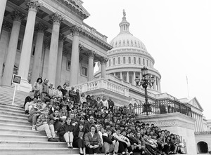 Congressman John W. Olver (back row, center) with visiting group, posed on the steps of the United States Capitol building