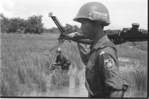 25th Division ARVN soldier patroling Can Giuoc's road.