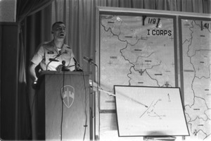 Colonel George Brown, briefing officer at the Joint United States Public Affairs Office.