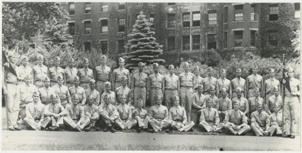 A group photograph of some Army Air Corps trainees in front of Alumni Hall (May 1943)