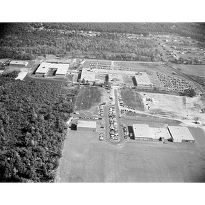 Suburban location of industrial buildings, some new construction, unidentified