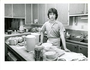 House of Hope volunteer Paul Santos works in House's kitchen