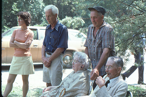 Robin Jensen, R.R.R. Brooks, and Arthur G. Rosenburg (standing left to right) in front of Ella M. and Arthur E. Rosenburg at Moon Barn Raising at entrance to Hopkins Forest on 2 August 1975.