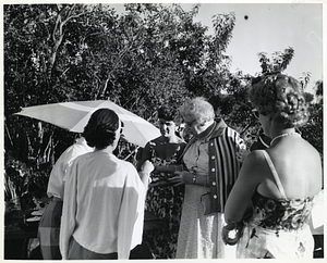 Unidentified women at outdoor summer gathering