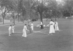 Women at a summer school playing a lawn game