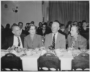John F. Martin with wife at banquet