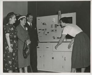 Occupational therapist demonstrating training panel