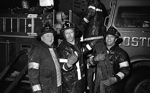 Boston firefighters Ray McDonough, Tom Dunphy, and James Reilly in front of fire engine