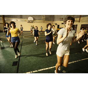 Women jogging in place in a gym