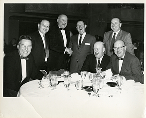 Charles Santos Jr. laughing with group of men