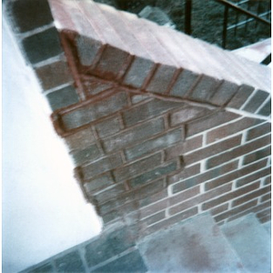 Brick staircase that has been repaired.