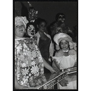 A group of girls pose in their Halloween costumes