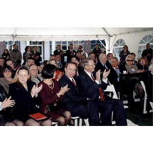 The audience applauds at the dedication of Shillman Hall